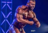 most muscular pose per Andrea Muzi sul palco del Fit Parade 2019 in Ungheria