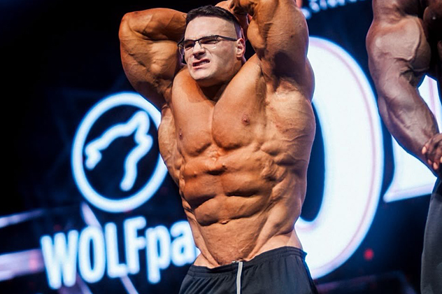 posa di addome e gambe di nick walker al press conference del mister olympia 2026